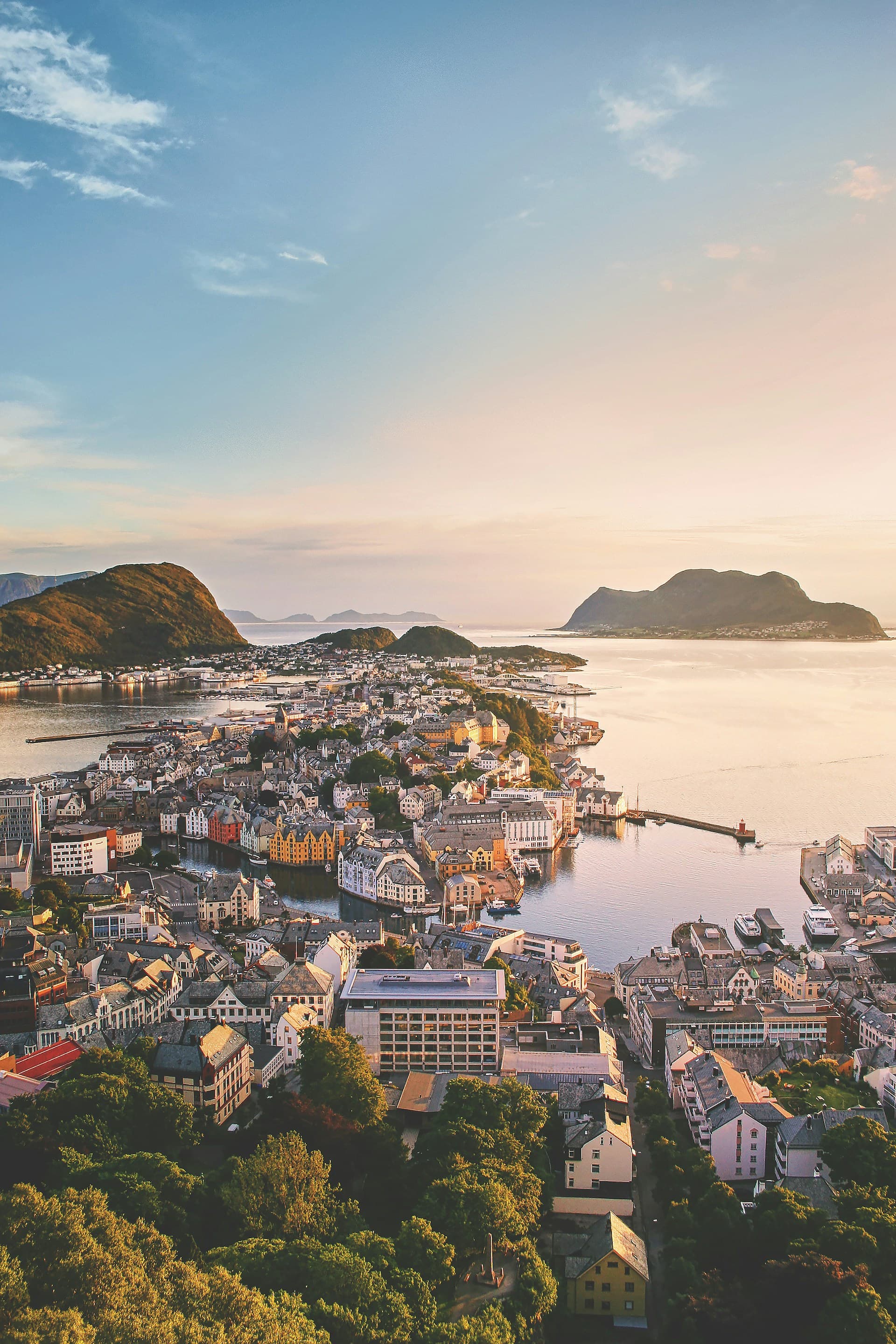 Aerial view of a Norwegian coastal town at golden hour