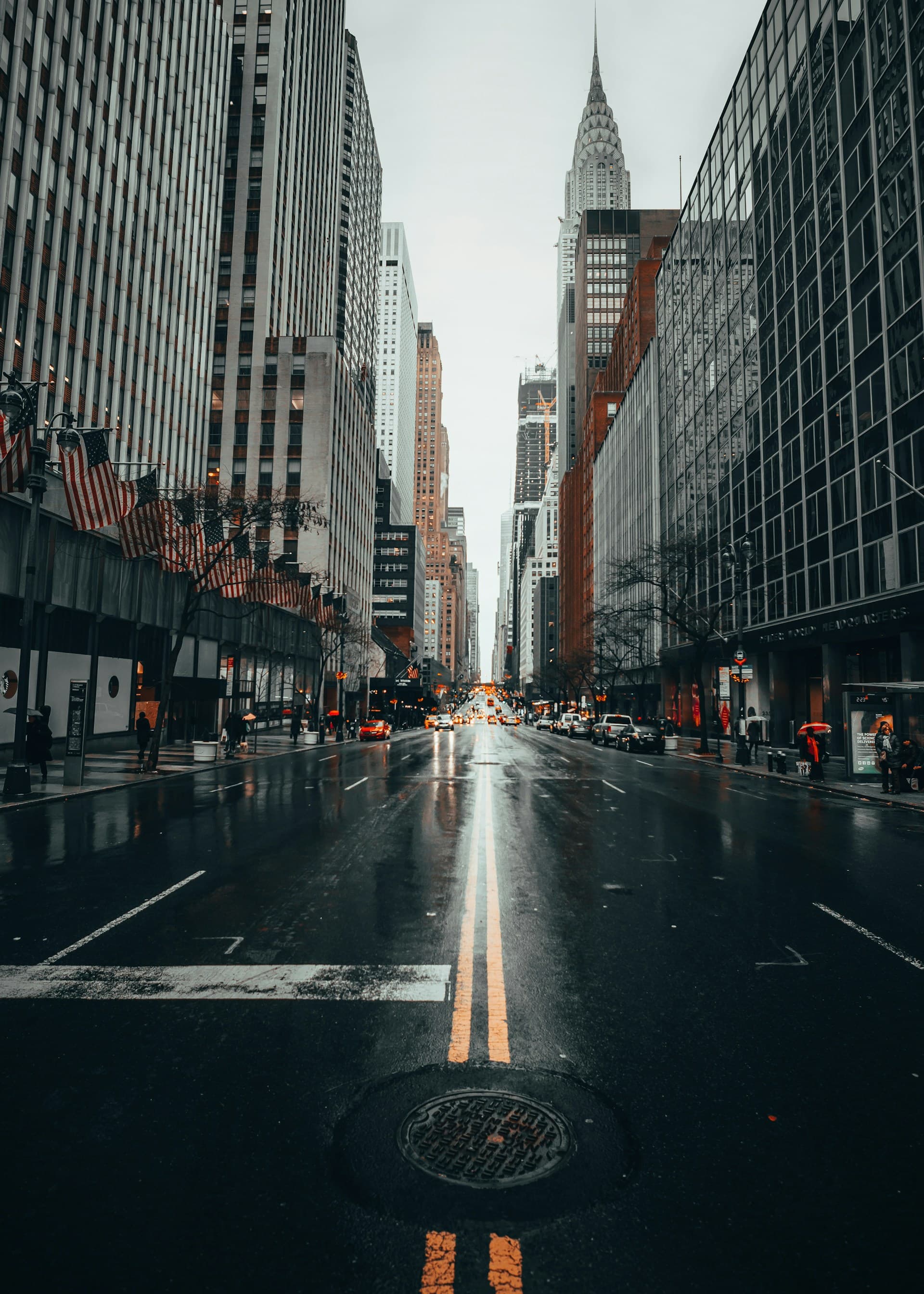 Rainy New York street with golden window light