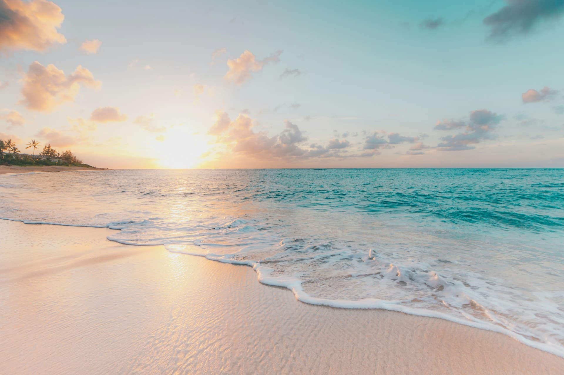 Pastel sunset over a tropical beach